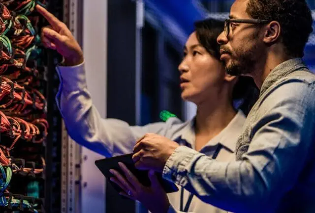 two person working at data centre