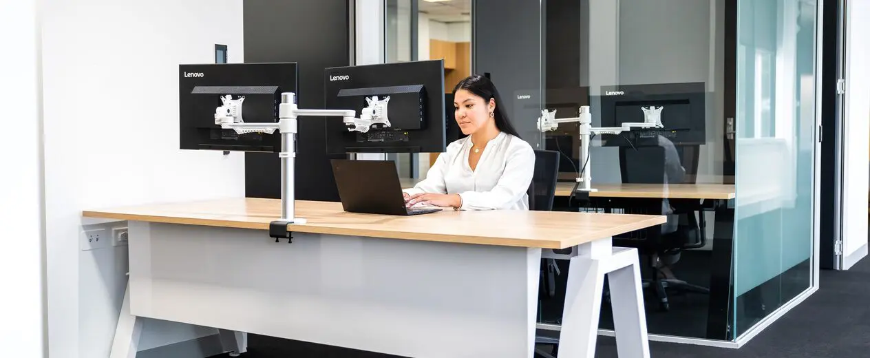 A women using computer at technology test lab facility in Sydney office